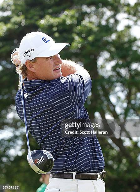 Ernie Els of South Africa tees off on the second tee box during the final round of the 2010 WGC-CA Championship at the TPC Blue Monster at Doral on...