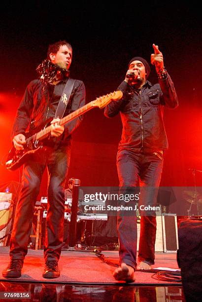 Michael Franti and Dave Shul performs at Freedom Hall on March 13, 2010 in Louisville, Kentucky.
