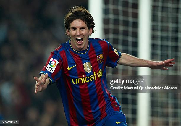 Lionel Messi of FC Barcelona celebrates after scoring during the La Liga match between Barcelona and Valencia at the Camp Nou Stadium on March 14,...