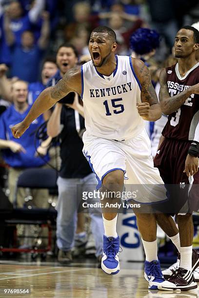 DeMarcus Cousins of the Kentucky Wildcats celebrates after he made a 2-point basket at the end of regulation to tie the game and send it to overtime...