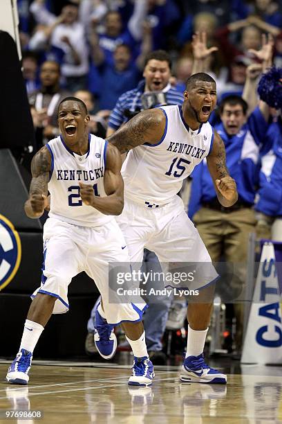 Eric Bledsoe and DeMarcus Cousins of the Kentucky Wildcats celebrates after Cousins made a 2-point basket at the end of regulation to tie the game...