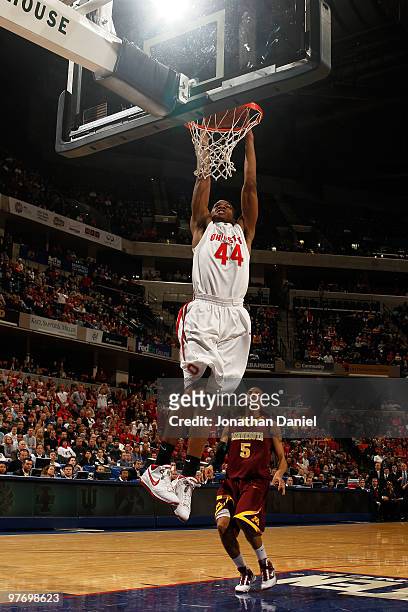 Guard William Buford of the Ohio State Buckeyes dunks the ball against the Minnesota Golden Gophers during the first half of the championship game in...
