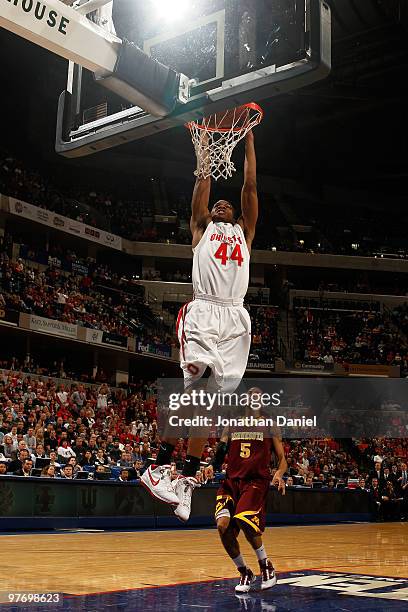Guard William Buford of the Ohio State Buckeyes dunks the ball against the Minnesota Golden Gophers during the first half of the championship game in...