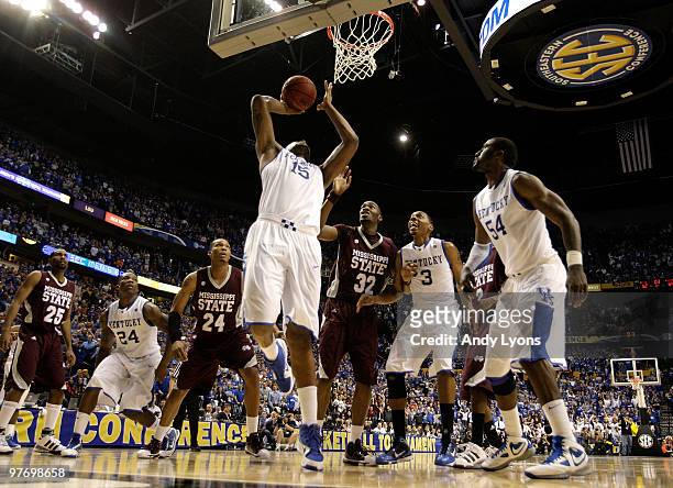 DeMarcus Cousins of the Kentucky Wildcats makes a 2-point basket at the end of regulatio to tie the game and send it into overtime against Jarvis...