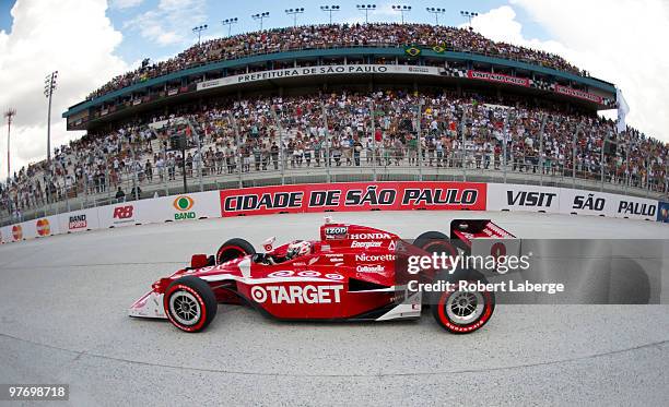 Scott Dixon driver of the Target Chip Ganassi Racing Dallara Honda during the IZOD IndyCar Series Sao Paulo Indy 300 on March 14, 2010 in the streets...