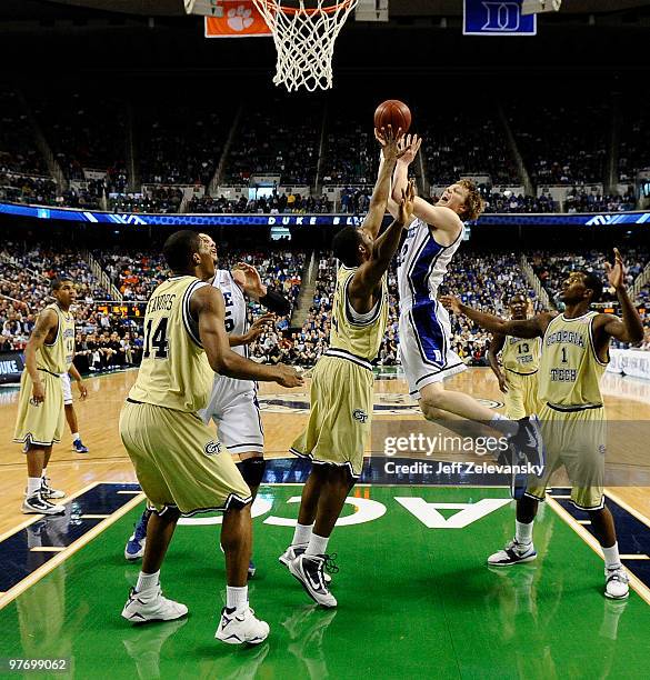 Kyle Singler of the Duke Blue Devils drives to the hoop against Georgia Tech Yellow Jackets in the championship game of the 2010 ACC Men's Basketball...