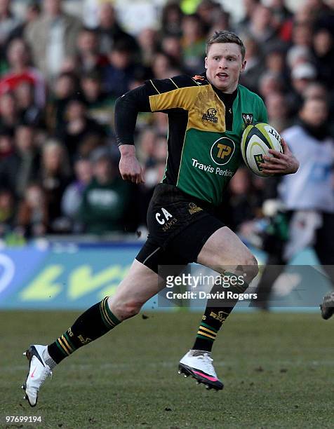 Chris Ashton of Northampton runs with the ball during the LV=Anglo Welsh Cup Semi Final between Northampton Saints and Saracens at Franklin's Gardens...