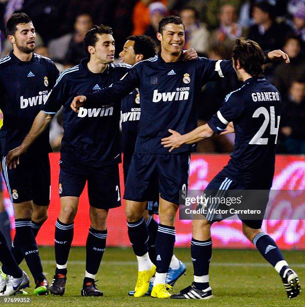 Cristiano Ronaldo of Real Madrid celebrates with Esteban Granero , Marcelo , Alvaro Arbeloa and Raul Albiol after scoring during the La Liga match...