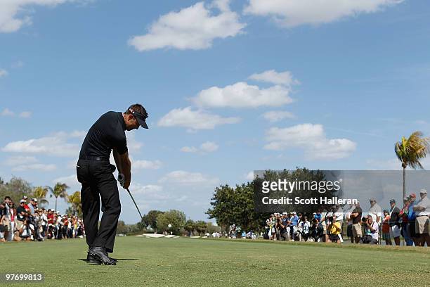 Charl Schwartzel of South Africa tees off on the fifth tee box during the final round of the 2010 WGC-CA Championship at the TPC Blue Monster at...