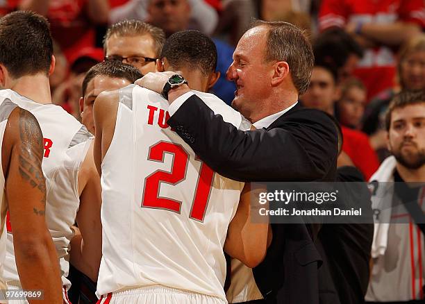 Guard Evan Turner and head coach Thad Matta of the Ohio State Buckeyes celebrate in the final moments of the championship game in the Big Ten Men's...