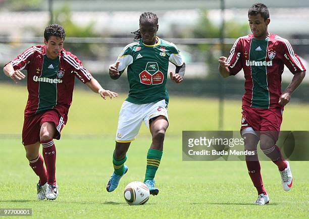 Bafana Bafana's Letsholonyane figths for the ball with a Fluminense player during the South African national soccer team training session at the...