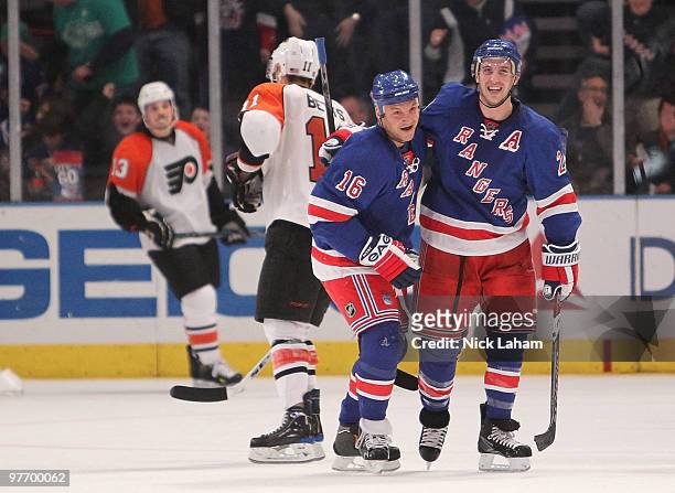 Sean Avery of the New York Rangers celebrates scoring his second goal with teammate Ryan Callahan against the Philadelphia Flyers at Madison Square...