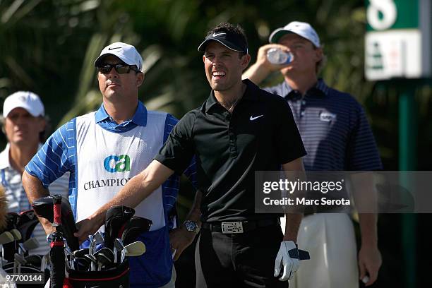 Charl Schwartzel of South Africa waits to tee off on the eighth tee box during the final round of the 2010 WGC-CA Championship at the TPC Blue...