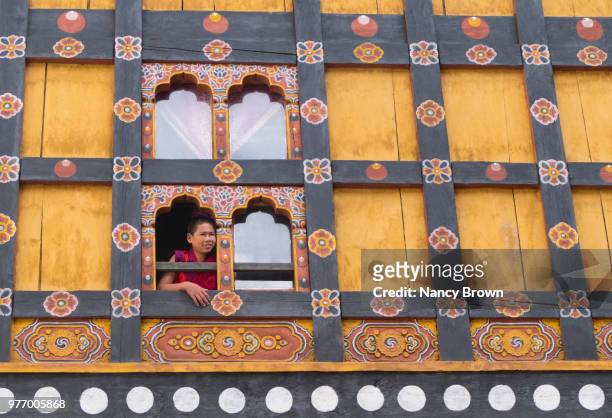 young buddhist monk in kyichhu temple  bhutan. - circa 7th century stock pictures, royalty-free photos & images