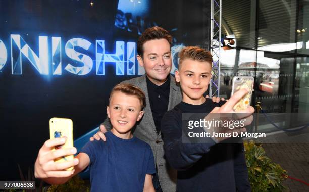 Television personality Stephen Mulhern has a selfie with two fans at the Ocean Cruise Terminal on June 17, 2018 in Southampton, England....