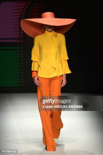 Model presents a creation by DAKS during the men & women's spring/summer 2019 collection fashion show in Milan, on June 17, 2018.