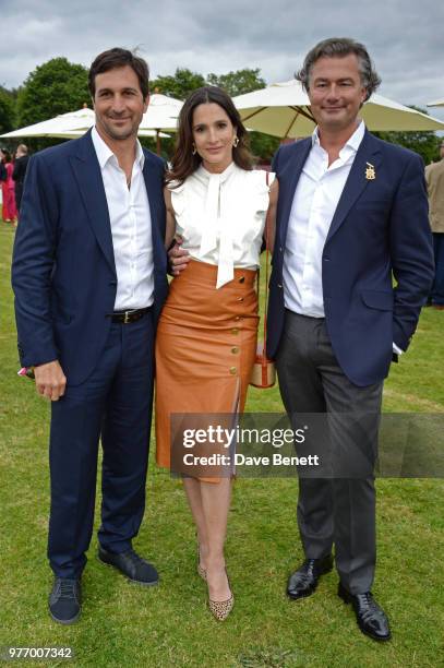 Eduardo Novillo Astrada, Astrid Munoz and Laurent Feniou attend the Cartier Queen's Cup Polo Final at Guards Polo Club on June 17, 2018 in Egham,...