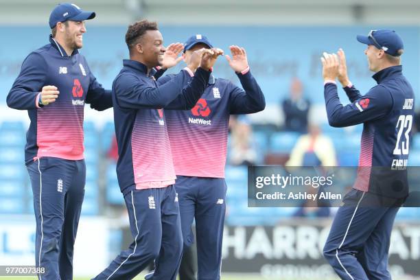 Delray Rawlins of ECB XI celebrates with teammates as he picks up a wicket during a tour match between ECB XI v India A at Headingley on June 17,...