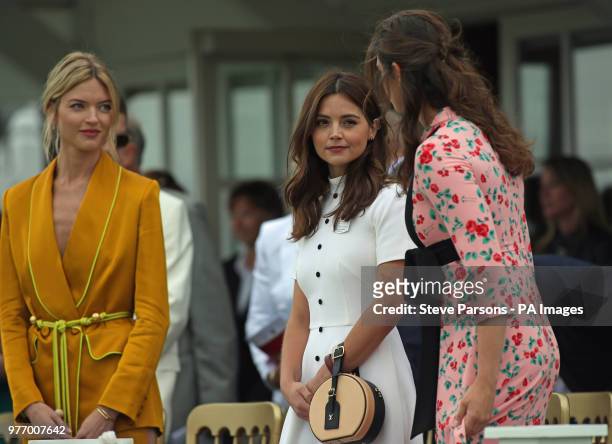 American model Martha Hunt and actress Jenna Coleman seen before the start of the Cartier Trophy at the Guards Polo Club, Windsor Great Park, Surrey.