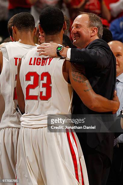 Guard David Lighty and head coach Thad Matta of the Ohio State Buckeyes celebrate in the final moments of the championship game in the Big Ten Men's...
