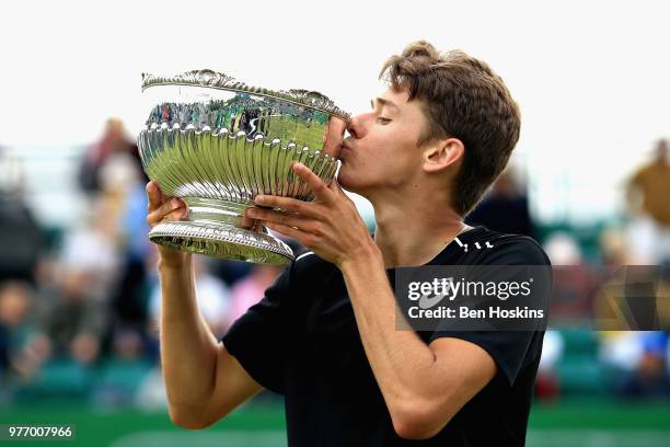 Alex De Minaur of Australia celebrates victory in the Mens Singles Final during Day Nine of the Nature Valley Open at Nottingham Tennis Centre on...