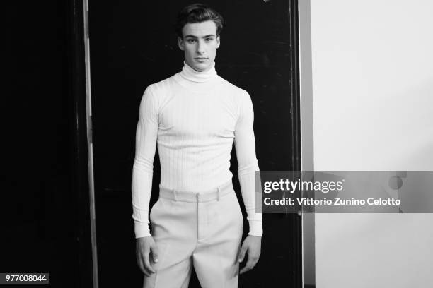 Model is seen backstage ahead of the Daks show during Milan Men's Fashion Week Spring/Summer 2019 on June 17, 2018 in Milan, Italy.