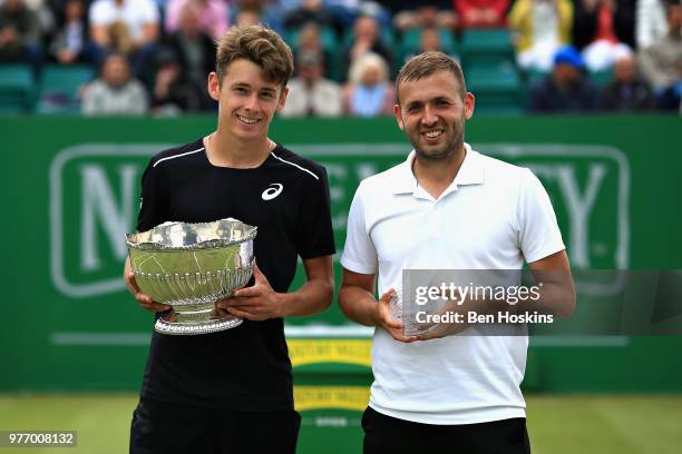 Alex De Minaur of Australia celebrates victory with runner up Dan Evans of Great Britain in the Mens Singles Final during Day Nine of the Nature...