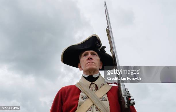 Tom Ramsey from Houghton le Spring poses for a picture as he represents a British Red Coat soldier from the American War of Independence during the...