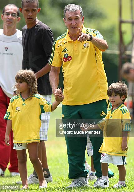 Bafana Bafana's head coach Carlos Alberto Parreira receives the visit of his grandchildren Leticia and Lucas during the South African national soccer...