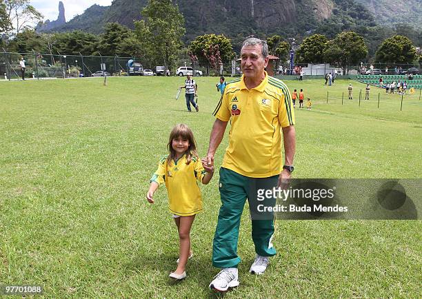 Head coach Parreira of Bafana Bafana with your granddaughter Leticia during a match against Fluminense as part of the South Africa national soccer...