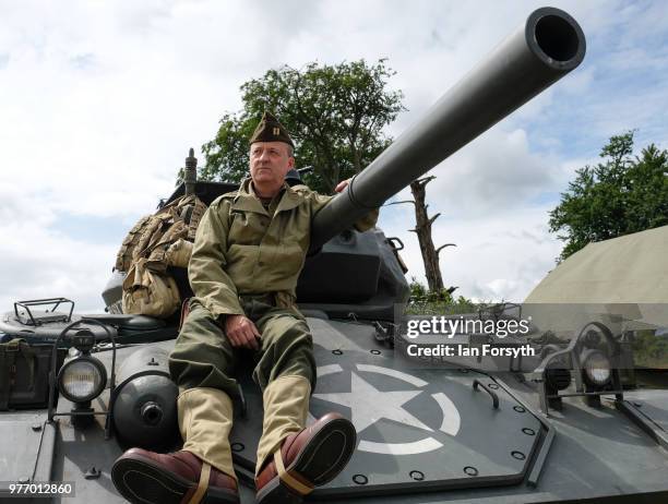 Martin Atwell from Middlesbrough depicts life as an American soldier with the 6 Armoured Division in World War Two as he sits on the deck of a tank...