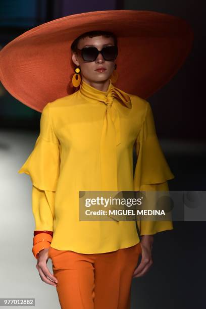 Model presents a creation by DAKS during the men & women's spring/summer 2019 collection fashion show in Milan, on June 17, 2018.