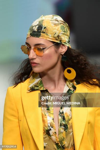 Model presents a creation by DAKS during the men & women's spring/summer 2019 collection fashion show in Milan, on June 17, 2018.