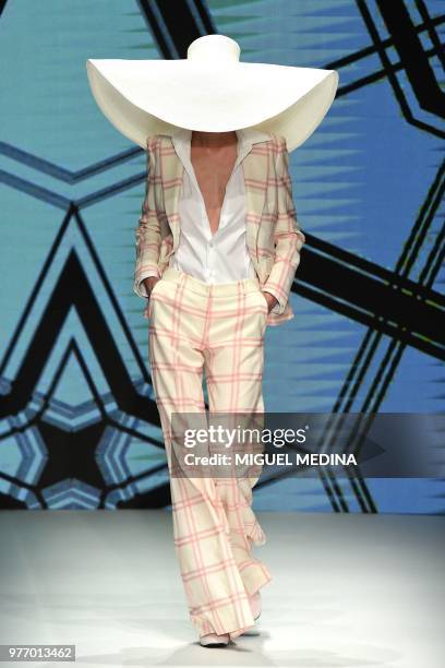 Model presents a creation by DAKS during the men & women's spring/summer 2019 collection fashion show in Milan, on June 17, 2018.