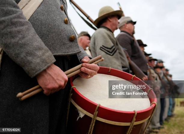 Re-enactors representing Confederate soldiers in the American Civil War practice their rifle drill during the Frontline Sedgefield living history...