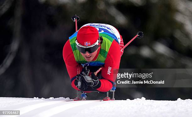 Tokedal Trygve Larsen of Norway competes in the Men's 15k Sitting Cross Country skiing event during Day 3 of the 2010 Vancouver Winter Paralympics at...