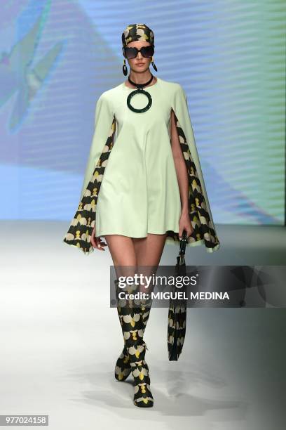 Model presents a creation by DAKS during the men & women's spring/summer 2019 collection fashion show in Milan, on June 17, 2018. AFP PHOTO/MIGUEL...