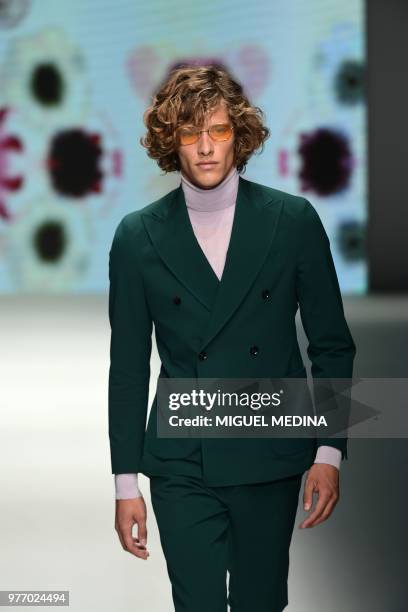 Model presents a creation by DAKS during the men & women's spring/summer 2019 collection fashion show in Milan, on June 17, 2018.