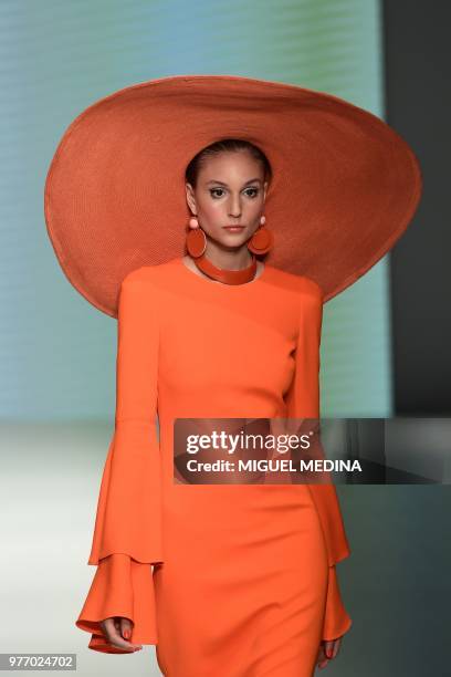 Model presents a creation by DAKS during the men & women's spring/summer 2019 collection fashion show in Milan, on June 17, 2018.
