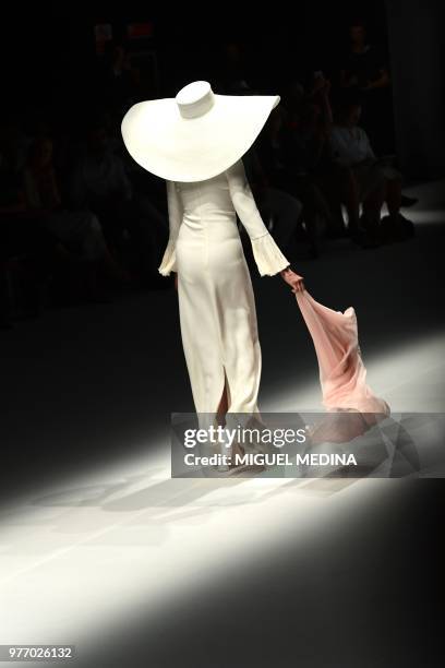 Model presents a creation by DAKS during the men & women's spring/summer 2019 collection fashion show in Milan, on June 17, 2018.