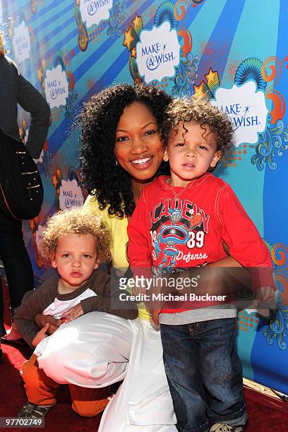 Actress Garcelle Beauvais with her children attend the Make-A-Wish Foundation's Day of Fun hosted by Kevin & Steffiana James held at Santa Monica...