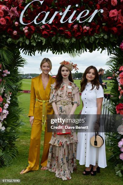 Martha Hunt, Lily Collins and Jenna Coleman attend the Cartier Queen's Cup Polo Final at Guards Polo Club on June 17, 2018 in Egham, England.