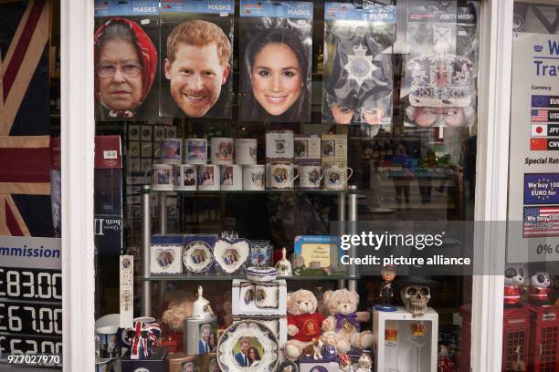 April 2018, Britain, Windsor: Souvenir articles showing prince harry and Meghan Markle for sale in a shop. Prince Harry and the American actress...