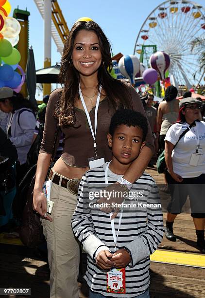 Actress Tracey Edmonds and son Dylan attend the Make-A-Wish Foundation's Day of Fun hosted by Kevin & Steffiana James held at Santa Monica Pier on...