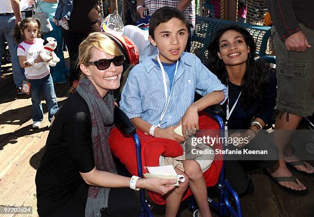 Actresses Leslie Bibb and Rosario Dawson attend the Make-A-Wish Foundation's Day of Fun hosted by Kevin & Steffiana James held at Santa Monica Pier...