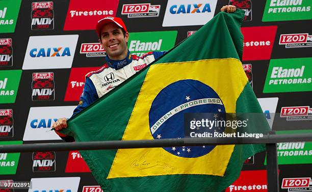 Vitor Meira celebrates his third place finish during the IZOD IndyCar Series Sao Paulo Indy 300 on March 14, 2010 in the streets of Sao Paulo in Sao...