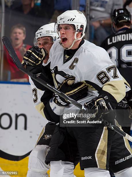 Sidney Crosby of the Pittsburgh Penguins reacts after teammate Sergei Gonchar scored the winning goal against the Tampa Bay Lightning at the St. Pete...