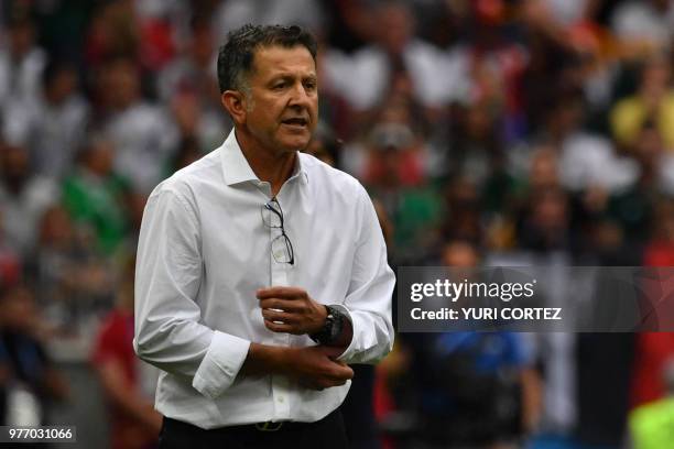 Mexico's coach Juan Carlos Osorio gestures on the sideline during the Russia 2018 World Cup Group F football match between Germany and Mexico at the...