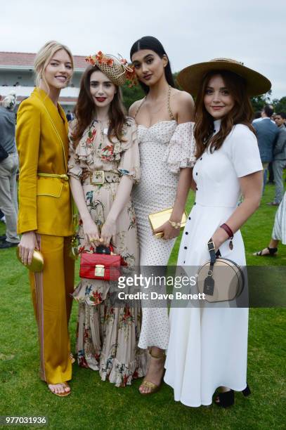 Martha Hunt, Lily Collins, Neelam Gill and Jenna Coleman attend the Cartier Queen's Cup Polo Final at Guards Polo Club on June 17, 2018 in Egham,...