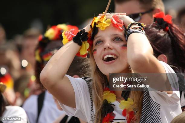 Germany fans react to play at the Fanmeile public viewing area during the Germany vs. Mexico 2018 FIFA World Cup match on June 17, 2018 in Berlin,...